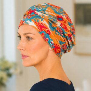 Turbante oncológico Nueva Caledonia estampado naranja y turquesa